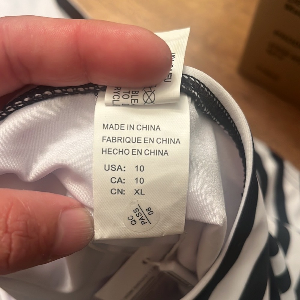 NWT Cocoship Swim Suite 
82% Nylon, 18% Elastane
Care Instructions
Hand Wash On - Picture 6 of 8